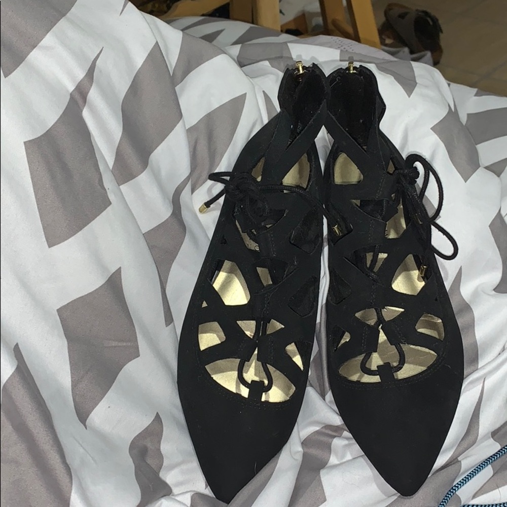 A pair of black dress shoes